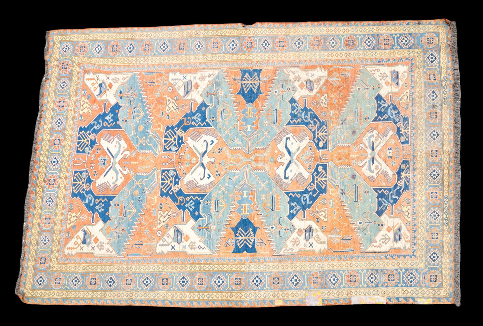 Satsuma Carpet - Large: Large Satsuma carpet approx. 8'8" x 11'5" w/ dull orange, dark blue, livid blue-gray, tan, & ivory patterns w/ geometric motifs. *All rugs / carpets are used & come from fine estates. Keystone Auction