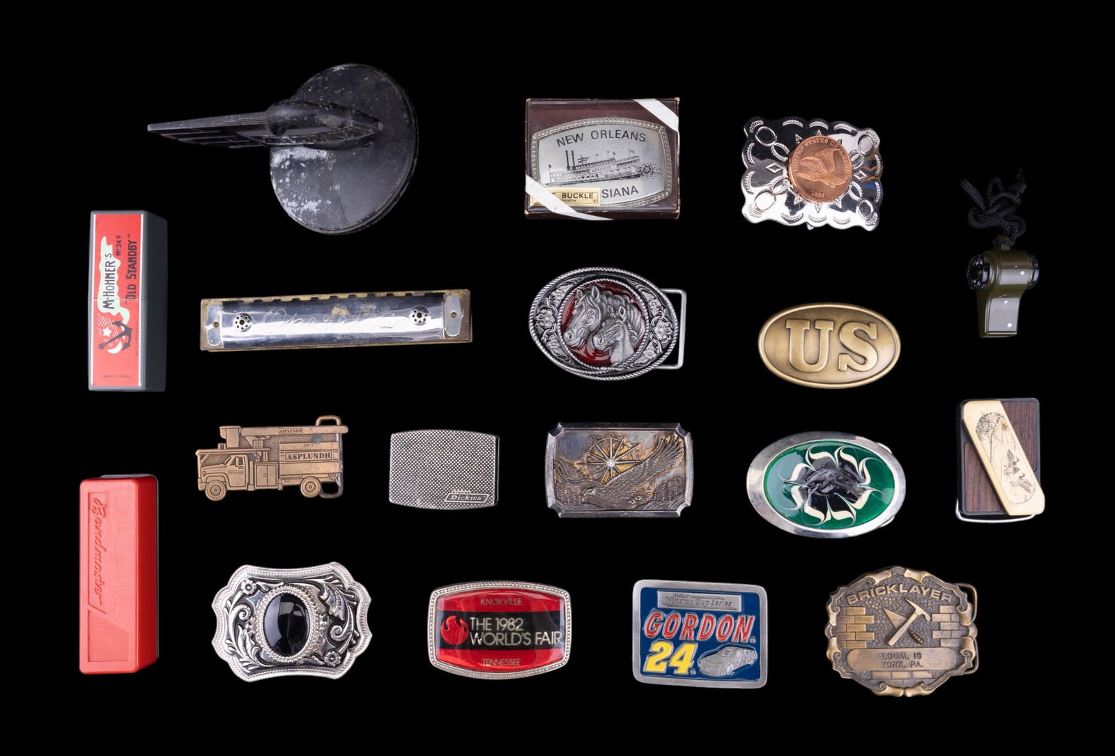 Vintage Belt Buckles & Harmonicas + Studebaker: Collection of 13 vintage belt buckles including an enameled Jeff Gordon NASCAR Winston Cup Series pewter buckle, a Bricklayer Local 16 York, PA buckle, a Touche Gerber Legendary Blades scrimshaw desig