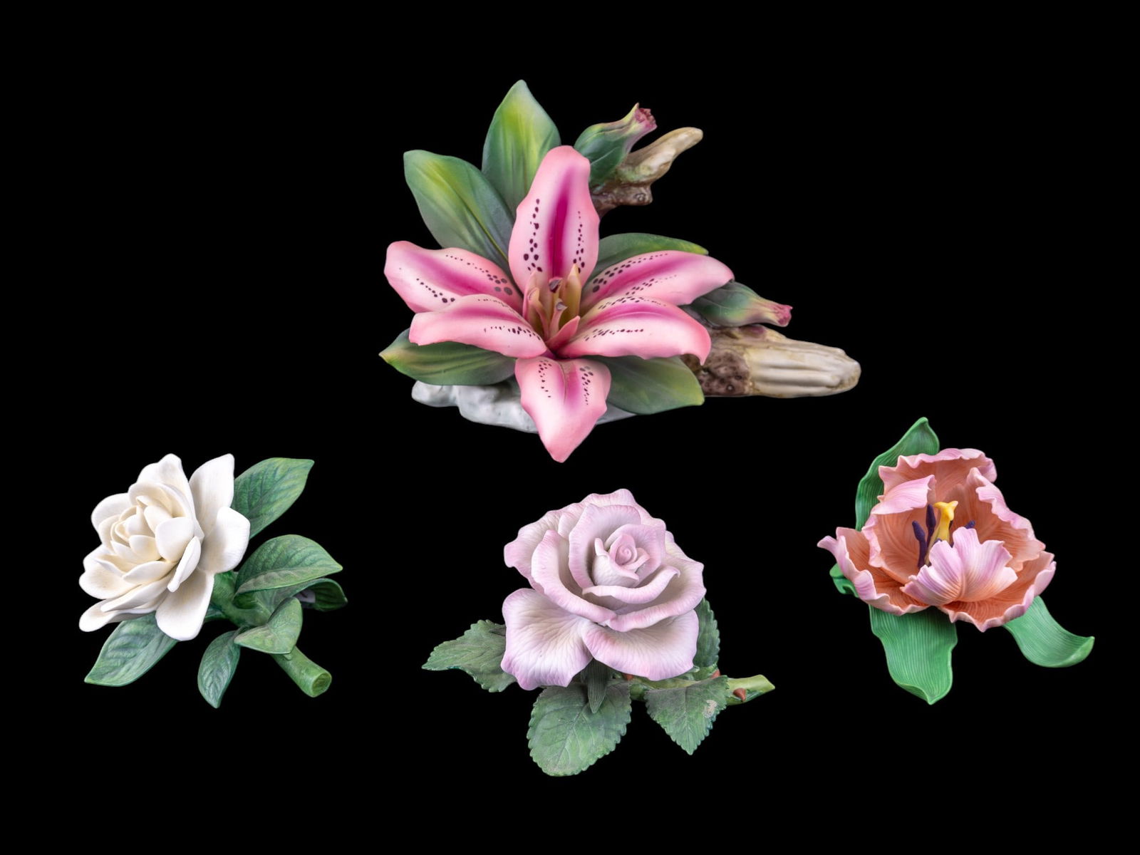 Capodimonte and Lenox Flower Figurines: Large Capodimonte Lily on a Log figurine, measures approx. 8" W x 6" H, Lenox Tea Rose (no date), Parrot Tulip (1989), and Gardenia (1995), note some chipped leaves.
