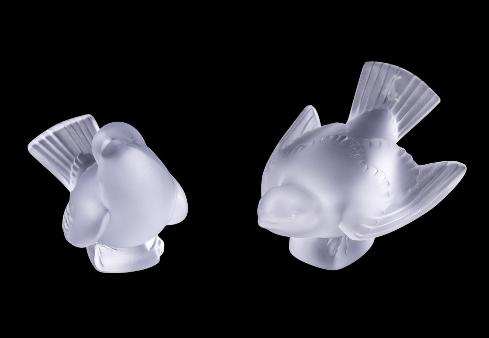 Lalique Sparrows (2): Two Lalique frosted crystal sparrow figurines, tallest measures approx. 3.5" H.
