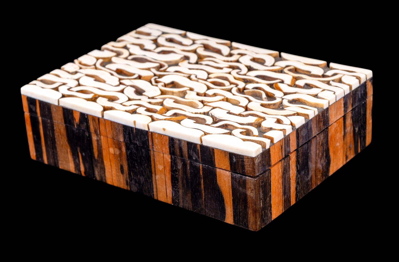 French Art Deco Bone Marquetry Box: Carved bovine bone and massacar ebony wood French Art Deco marquetry keepsake box, 7"W x 5.25" D x 2"H. On the interior lid of the box there is a raised artist logo/signature.