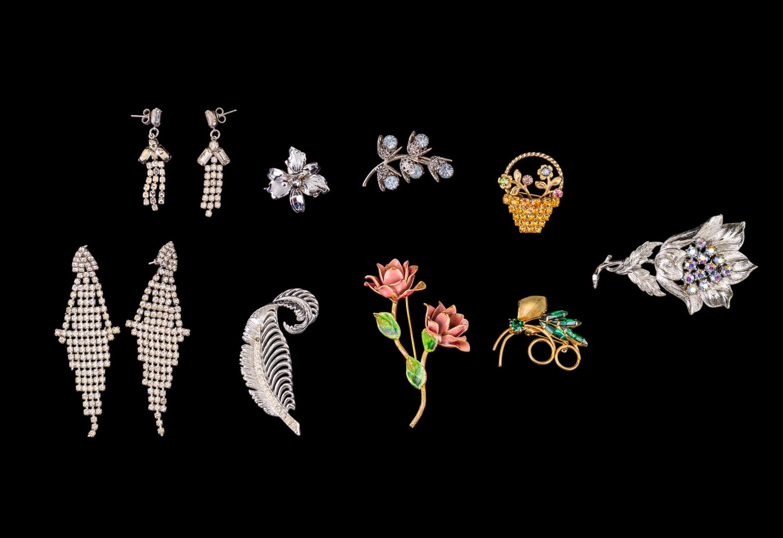 Coro & Vintage Jewelry: Coro floral pin in original box, floral pins, rhinestone earrings, silver tone feather brooch, & more.