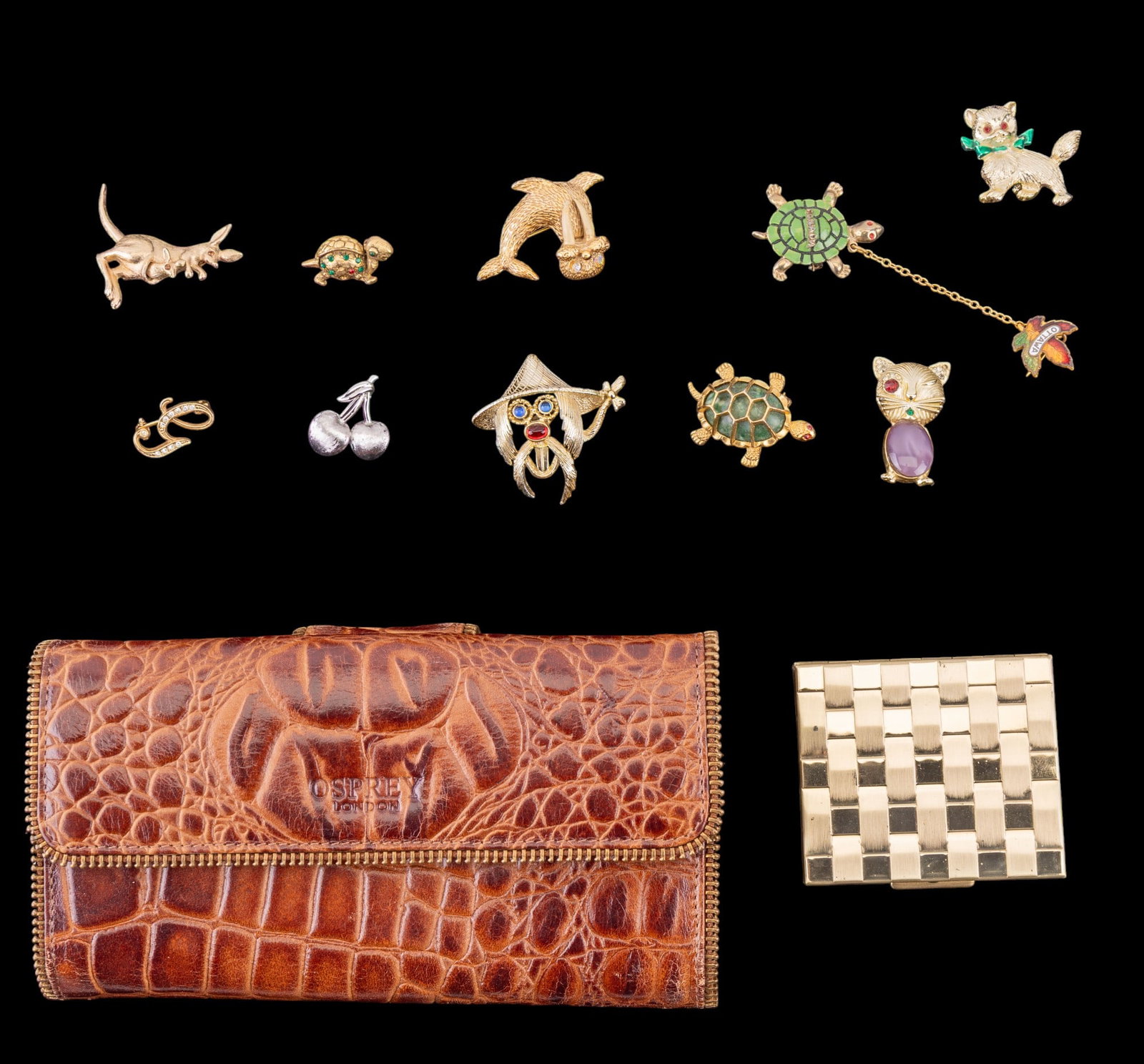 Osprey's Clutch, Brooches, & More: Osprey's of London by Graeme Ellisdon clutch wallet, compact, & many whimsical pins & brooches (one signed "Trifari", one signed "Avon", & more).