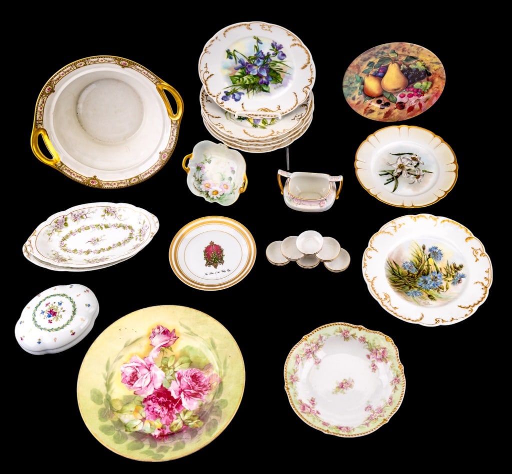 Haviland and Other Limoges Plates: An assortment of Limoges dishes and plates including Theodore Haviland 11" serving bowl, note missing lid and hairline, 6 salt cellars made for Tiche-Goettinger Co Dallas, TX, Faberge Lily of the Vall