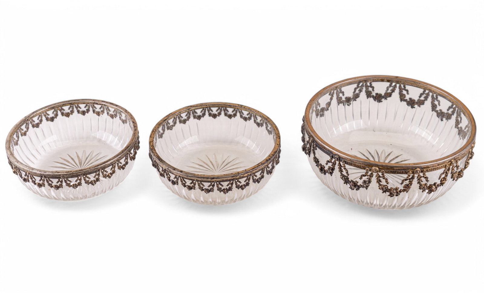 Antique German 800 Silver Cut Crystal Bowls (3): Three antique cut crystal bowls with ornate floral rim frames marked German 800 purity silver, the two small bowls measure approx. 5.75" diam and the larger bowl measures approx. 7.25" diam, note the 