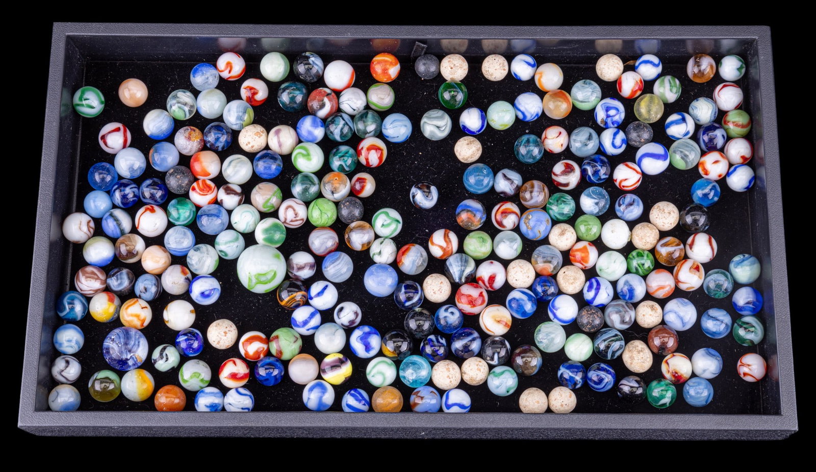 Assorted Glass & Clay Marbles (~215): Collection of approx. 215 glass & clay marbles, some are shooters. Most marbles are glass & small to medium size. Green & blue are the predominant colors. Various ages, sizes, and conditions, as per p