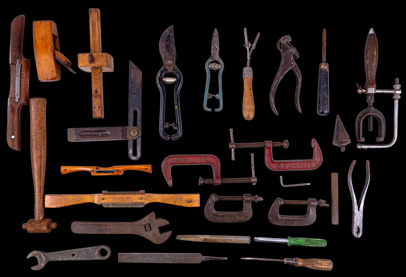 Early Vintage Wood Working Tools and Clamps: A collection of early vintage Stanley draw knives and a scribe, small planers, and an assortment of C-clamps, wrenches, and more.