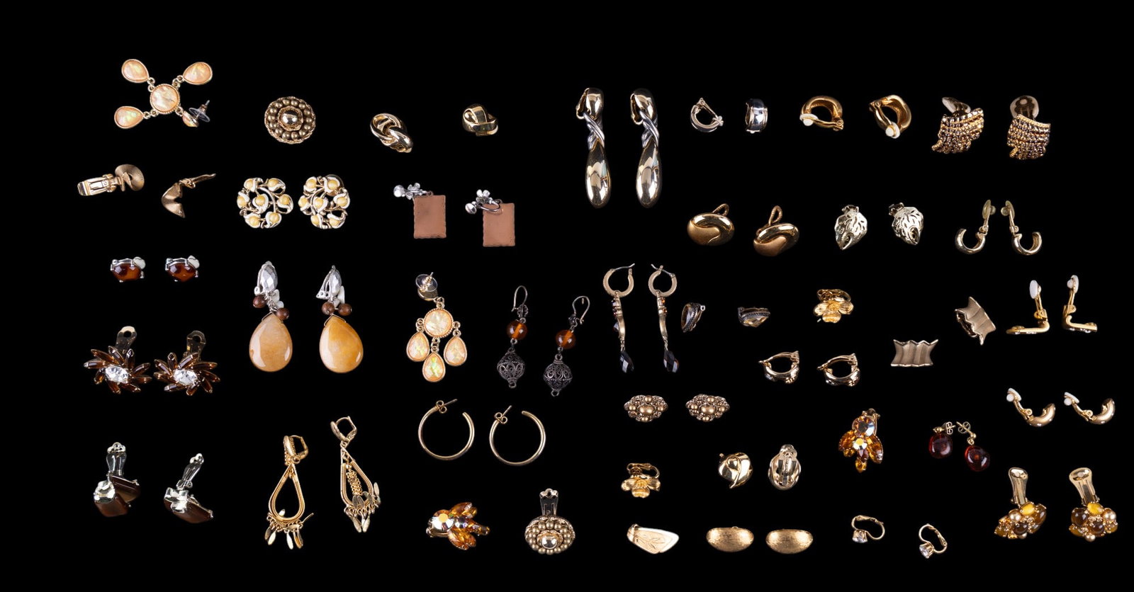 Designer Costume Earrings (35 pairs): A collection of 35 pairs of designer costume earrings featuring brands such as Liz Claiborne, Monet, Beau Jewels, Trifari, Replica, Gay Boyer, Ciner, Avon, Coro, a pair of rolled gold clip on earrings
