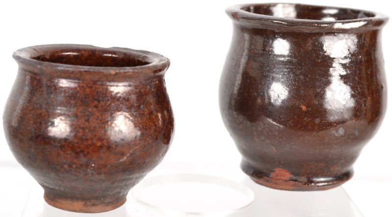 Two Miniature Redware Crocks: Two miniature redware crocks: largest measures 2"h