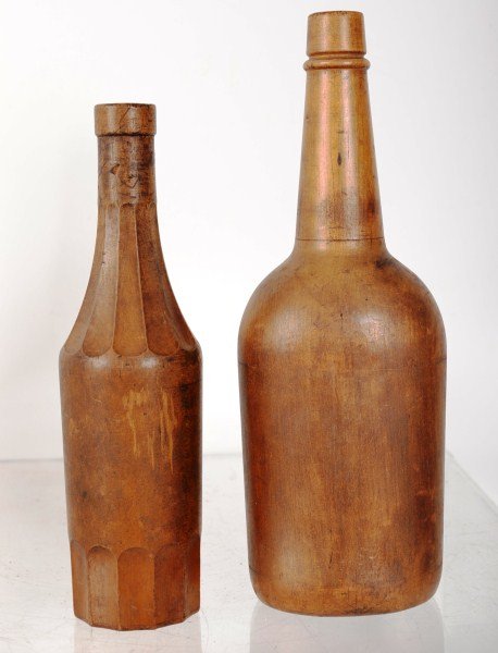 Two Wooden Bottle Molds: Two early Glassmaker's bottle molds, in excellent condition with good patina; largest is appx 12" tall