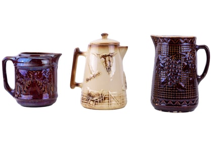 Early McCoy and North Star Pottery Pitchers