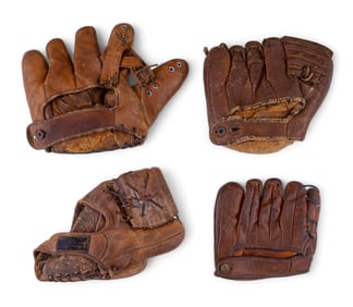 Four Mid 20th Century Baseball Gloves