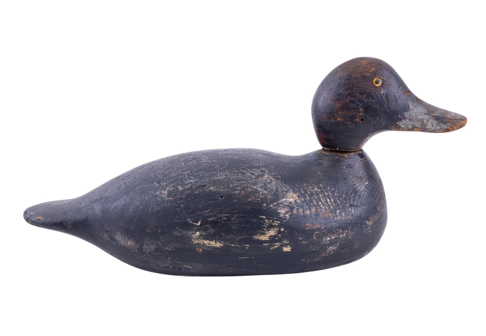 Black Duck Carved Wood Decoy: Hand-carved & hand-painted wood black duck decoy. There are some minor chips & scratches. Item measures approx. 6.75" tall & 14.5" long. The eyes are made of glass & the head swivels to make the decoy