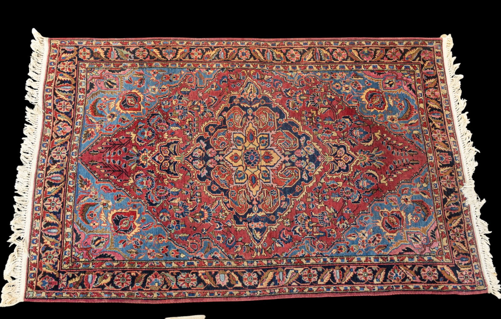 Semi-Antique Persian Rug: Semi-antique Persian rug great quality approx. 7'1" x 4'5" w/ red, blue, livid blue-grey, brown, tan, & ivory patterns w/ floral motifs. See photos for further details. *All rugs / carpets are used &
