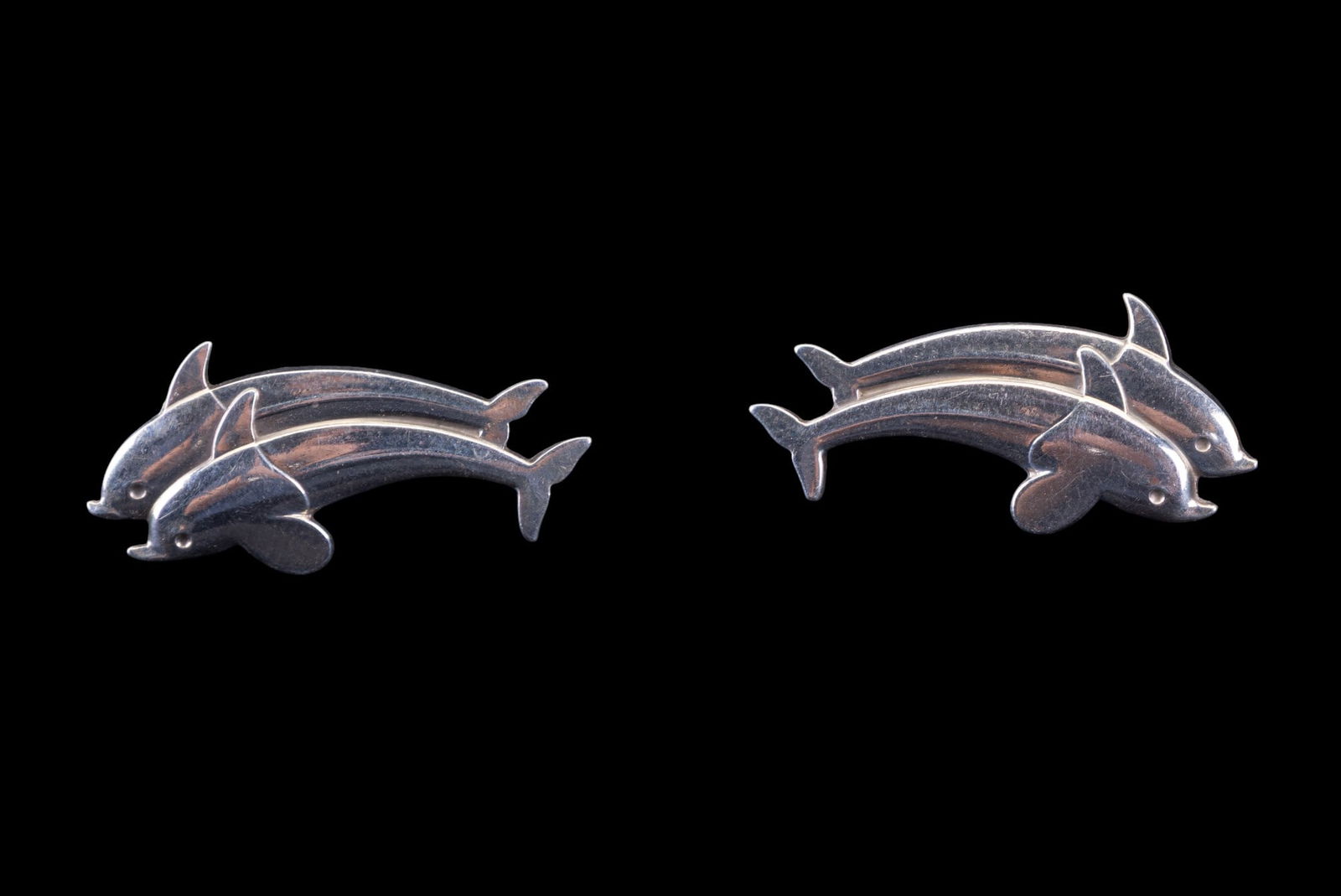Georg Jensen Sterling Modernist Vintage Earrings: Rare signed Georg Jensen sterling silver modernist twin Dolphin stud earrings, marked 'Denmark 129'