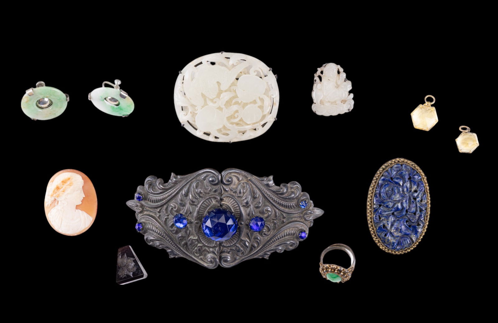 Victorian and Chinese Jade Estate Jewelry: Large unmarked sterling and carved jade brooch depicting a Chinese bat and fruit, carved lapis lazuli floral clip, Victorian ornate buckle with blue rhinestones, apple green jade and silver tone screw