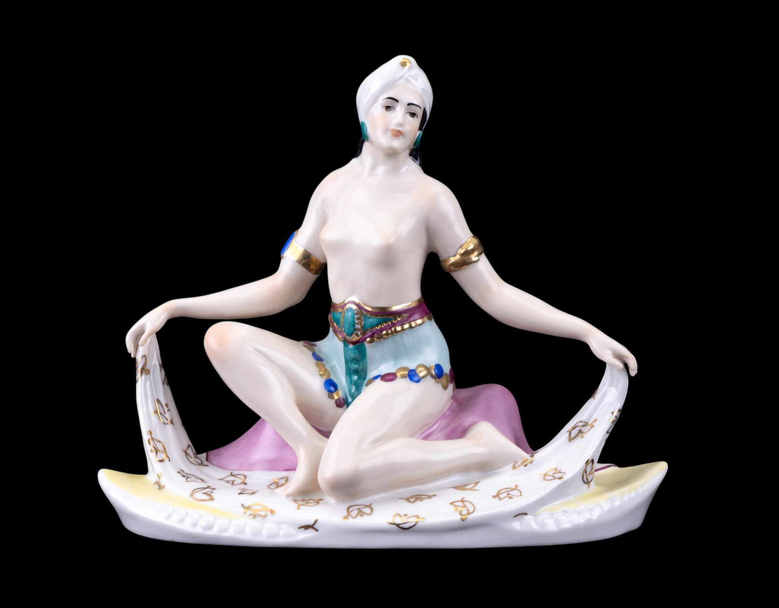 Karl Ens German Porcelain Harem Dancer: A hand painted German porcelain figurine of a half-nude harem dancer made by Karl Ens. Item is in very good condition as seen in photography. Karl Ens mark can be found in bottom of piece. Measurement