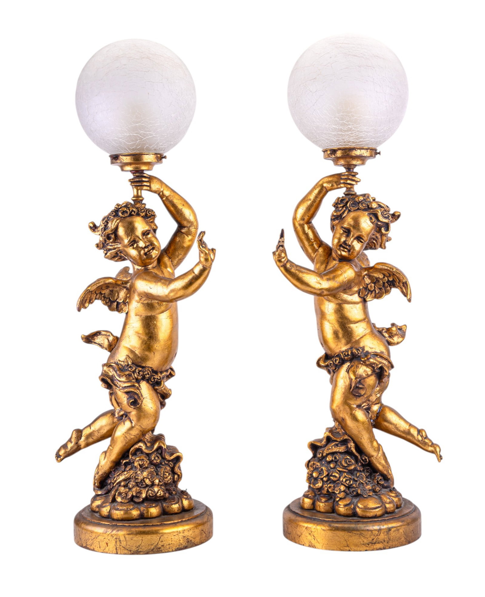 Pair, Cherub Lamps w/ White Globe Shades: Pair of vintage gilded composite cherub table lamps w/ textured white globe shades. One cherub is missing its thumb on its right hand, the other cherub is missing all but the index finger on its left 