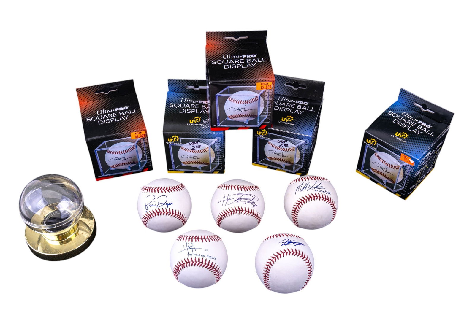 Signed Baseball Collection: A collection of signed baseballs featuring signatures of Matt Weifers, Brian Dozier, and three other unknown player signatures, and six lucite display boxes.