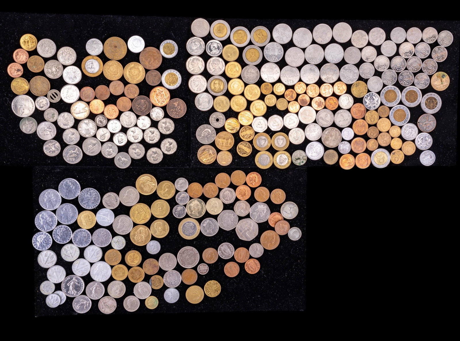 International Coin Currency: A large assortment of European coins featuring coins from the United Kingdom, Germany, Italy, Greece, and France, a collection of African and Asian currency featuring coins from Thailand, Nepal, Japan