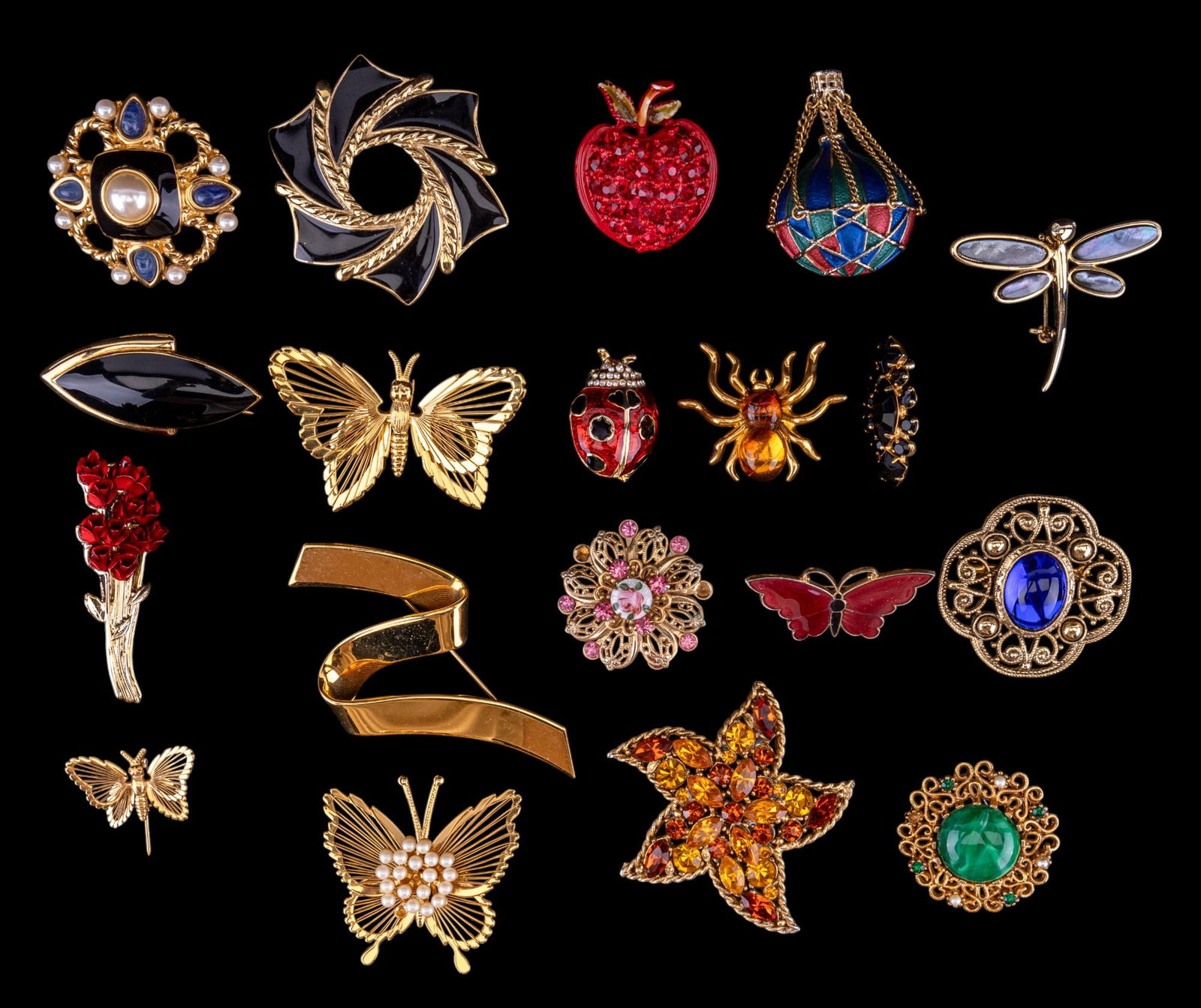 Trifari and Vintage Brooches: Trifari black enamel brooch, several designer brooches including Monet, whimsical ladybug to butterfly spider, and more.