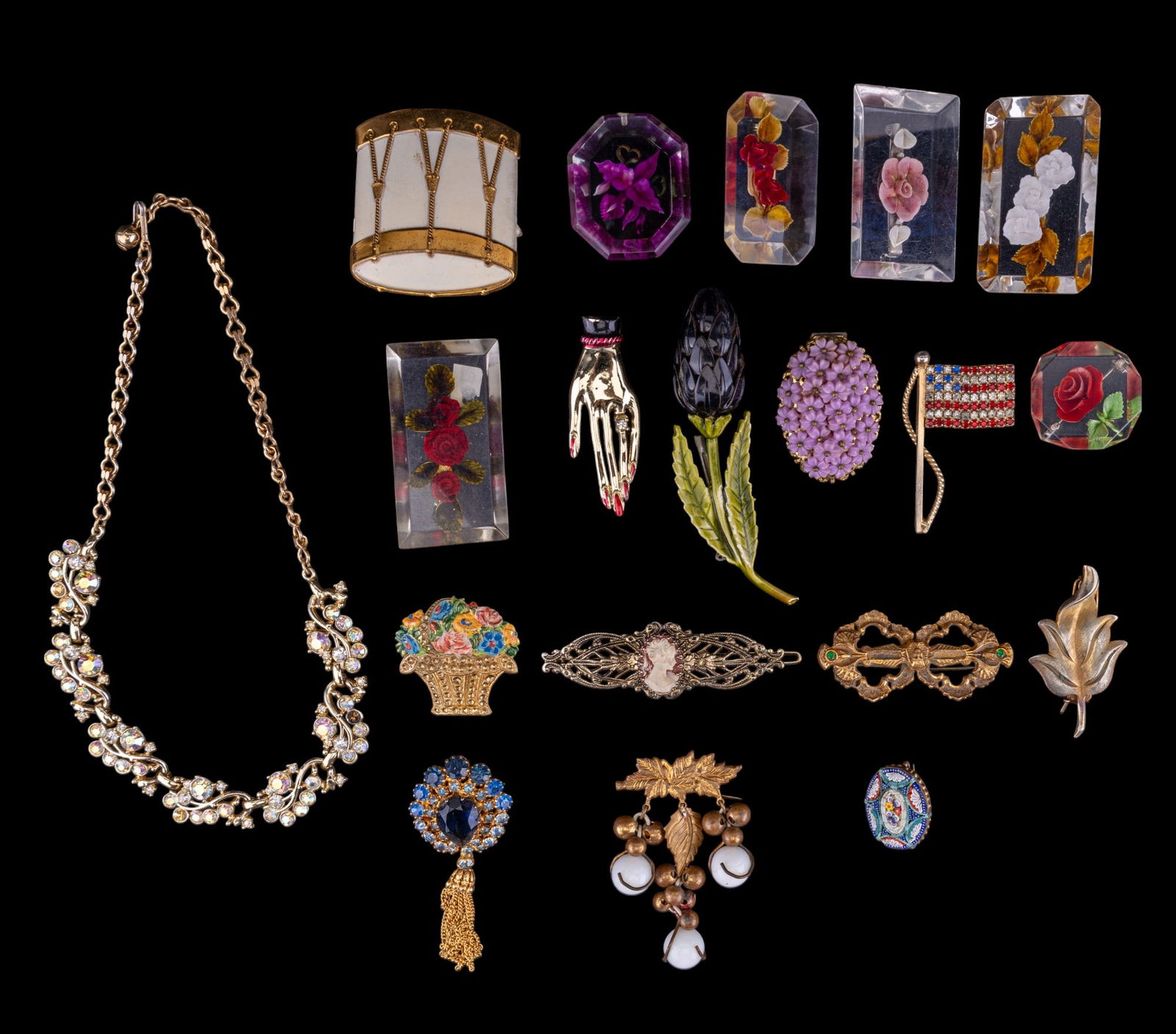 Lucite and Vintage Jewelry: Six vintage lucite floral brooches, aged approx. early to mid 1950s, gold tone iridescent rhinestone crystal necklace, blue teardrop crystal and gold tone tassel brooch made in Austria, and more.