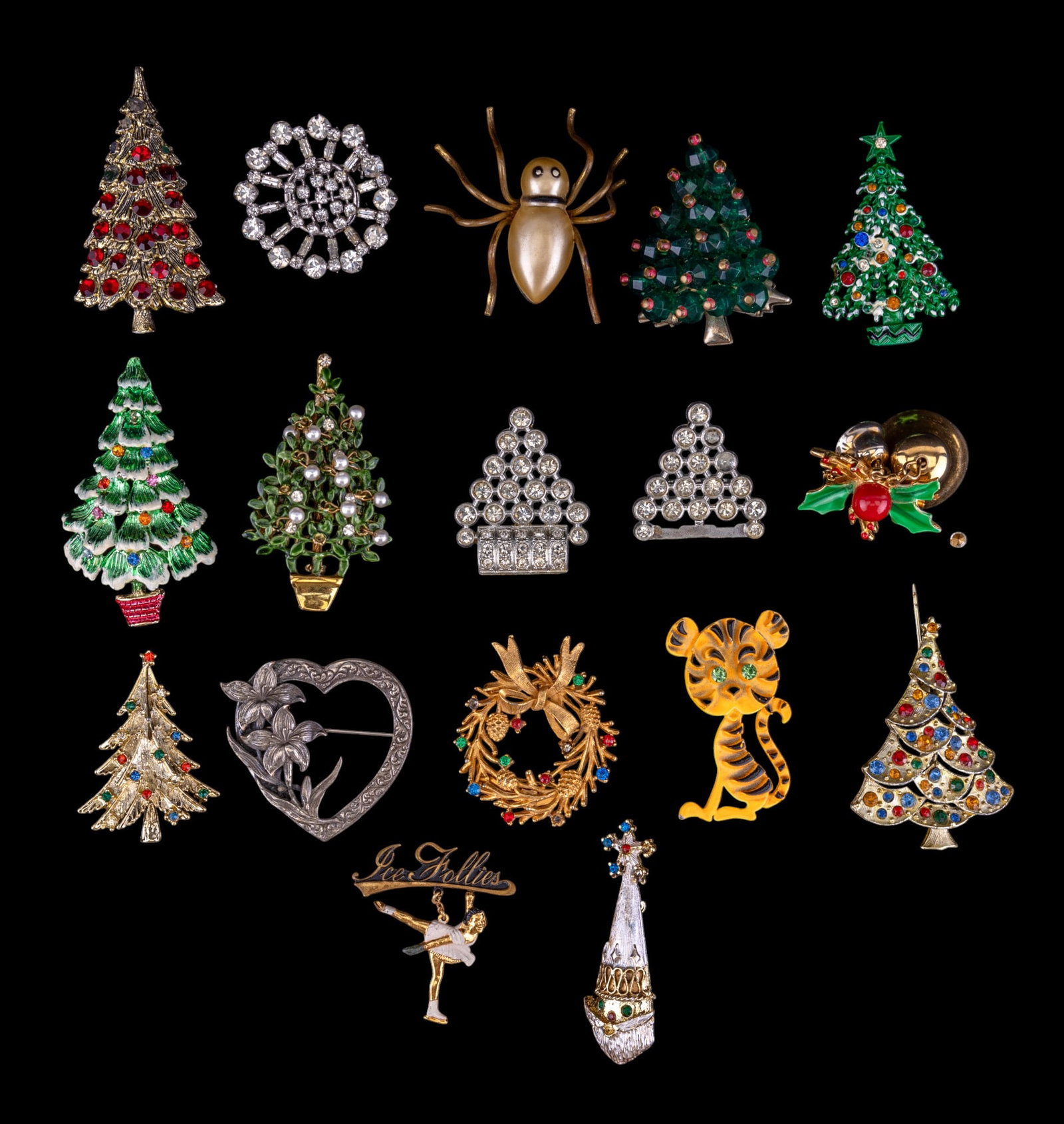 Christmas and Vintage Brooches: Large collection of various Christmas brooches, one with dangling pearl 'ornaments' by Roberts, rhinestone snowflake made in Austria, Santa Claus, Tiger, and more.
