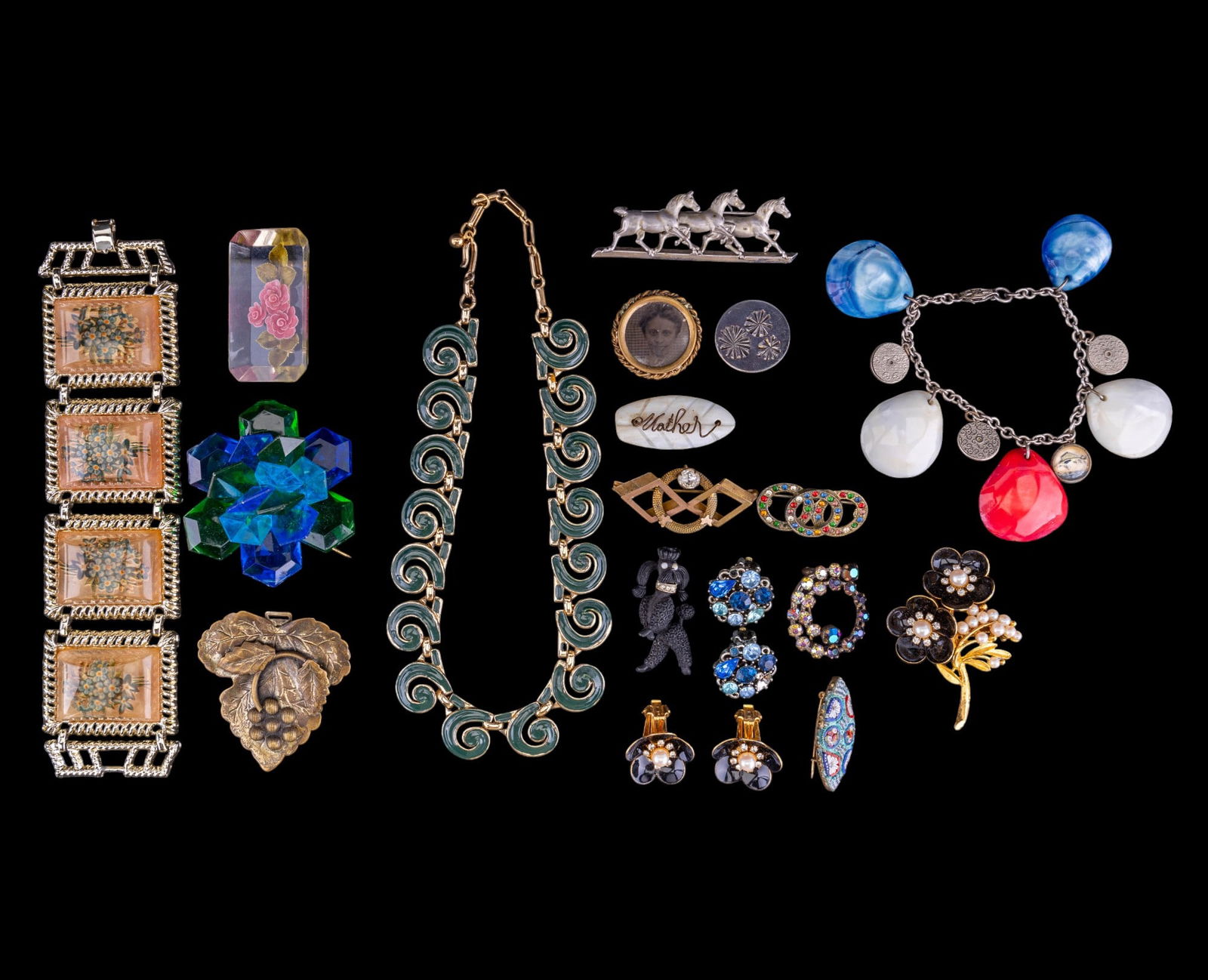 Vintage Coro, Lisner, Trifari, and More: Signed Coro horse brooch, Trifari greeen enamel swirl necklace, Lisner earrings, brooches, lucite, seashell earrings, and more.