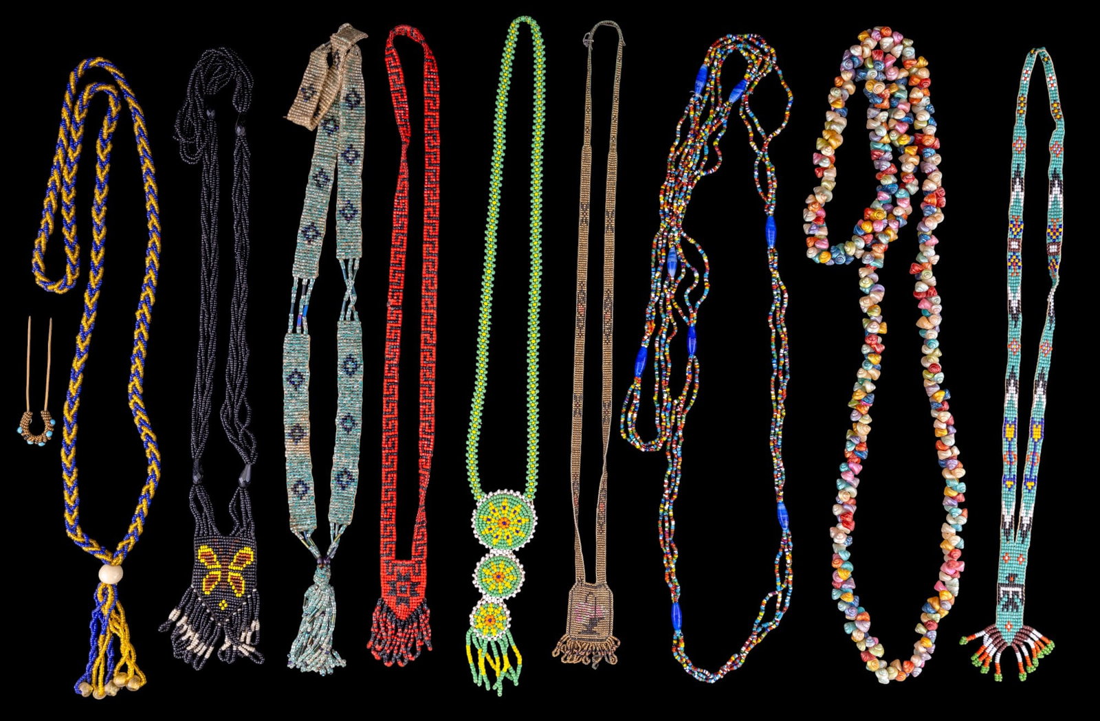 Vintage Necklaces (9): An assortment of 9 vintage necklaces including micro-bead Art Deco and Native American inspired woven necklaces, multicolored seashell necklace, and more.