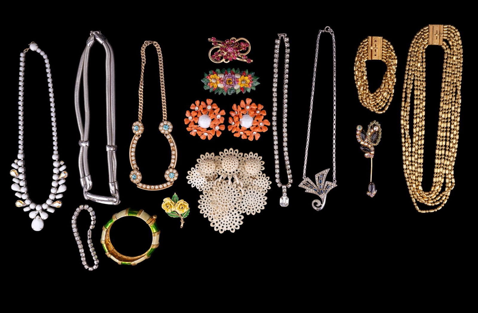 Original by Robert and Vintage Estate Jewelry: Original by Robert gold tone and green enamel bracelet, yellow rose brooch by Trifari, large orange flower celluloid clip on earrings, silver tone rope necklace by Monet, rhinestone tennis bracelet by