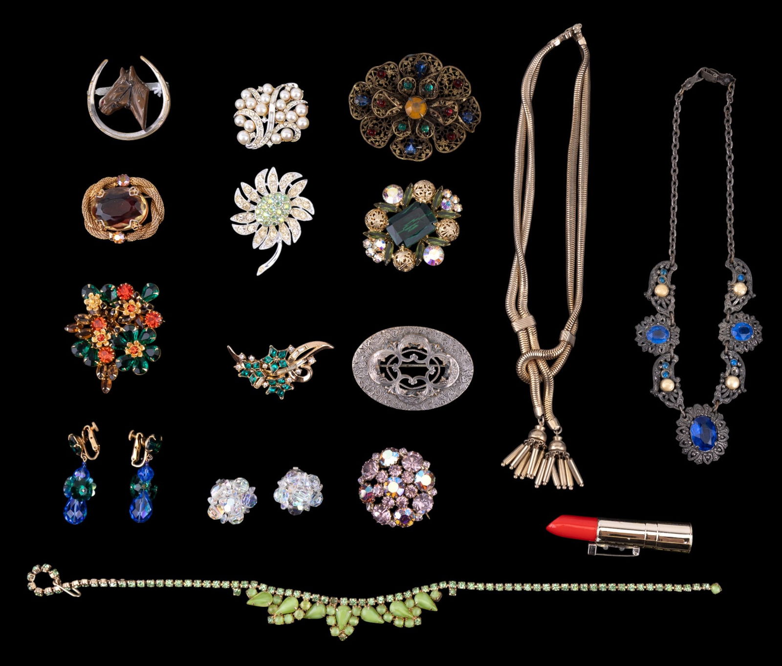 Vendome, Weiss, and Vintage Estate Jewelry: Vintage estate jewelry including a green Trifari pin, blue and green Vendome clip on drop earrings, Sarah Coventry silver tone daisy brooch, pink Weiss brooch, other brooches and vintage necklaces.