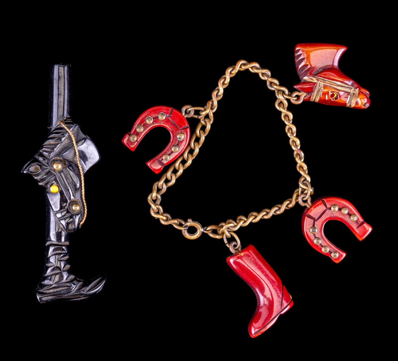 Vintage Bakelite Horse Jewelry: Bakelite jewelry featuring a red bakelite horse charm bracelet and a black horse brooch.