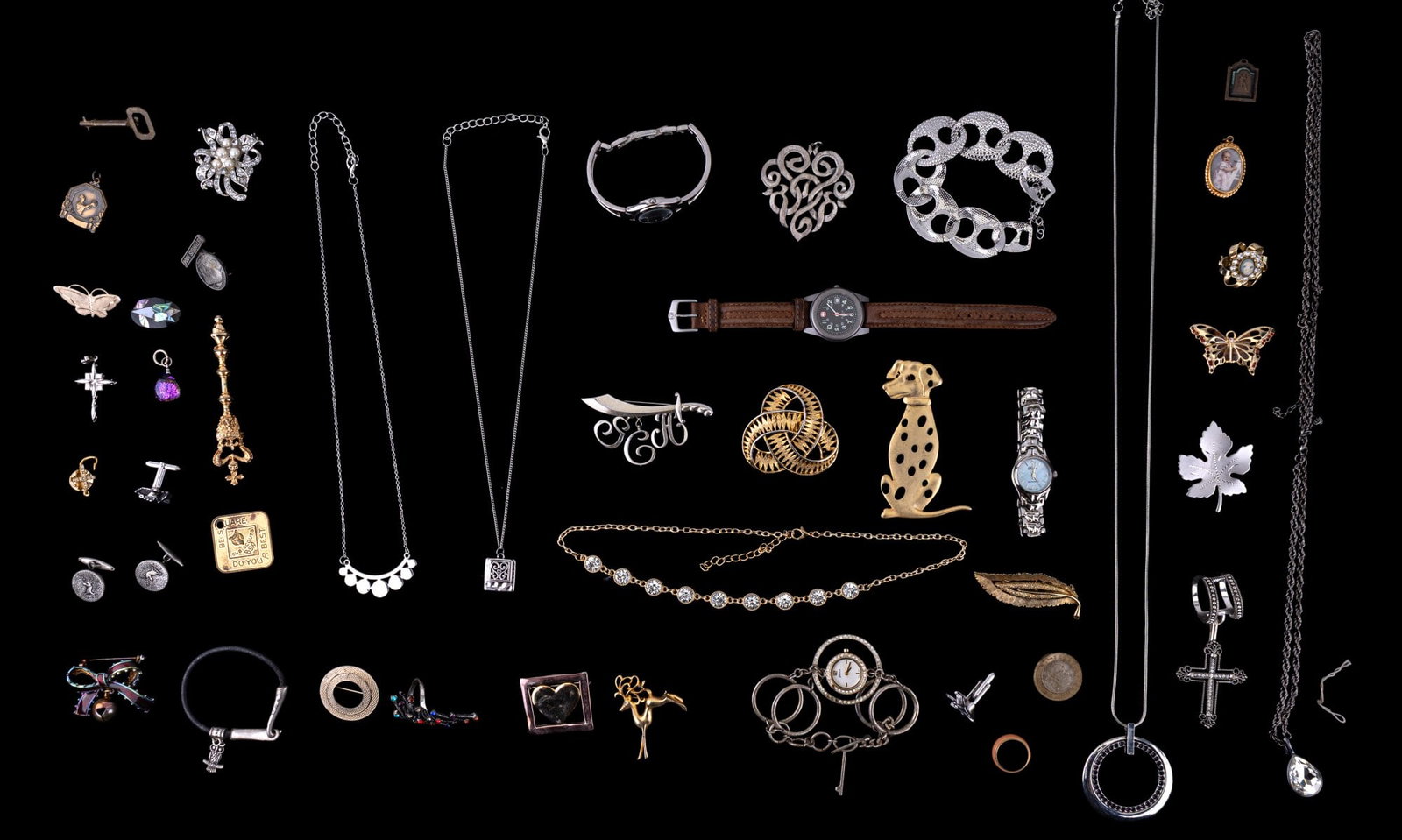 Men's and Womens Jewelry: Costume and fashion men's and women's jewelry including brooches, cufflinks, Royalton watch, Geneva watch, Swiss watch and an Anna Klein watch, plus many other items.