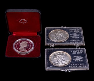 Two 1991 Silver Eagles, Toronto 150th Silver Coin