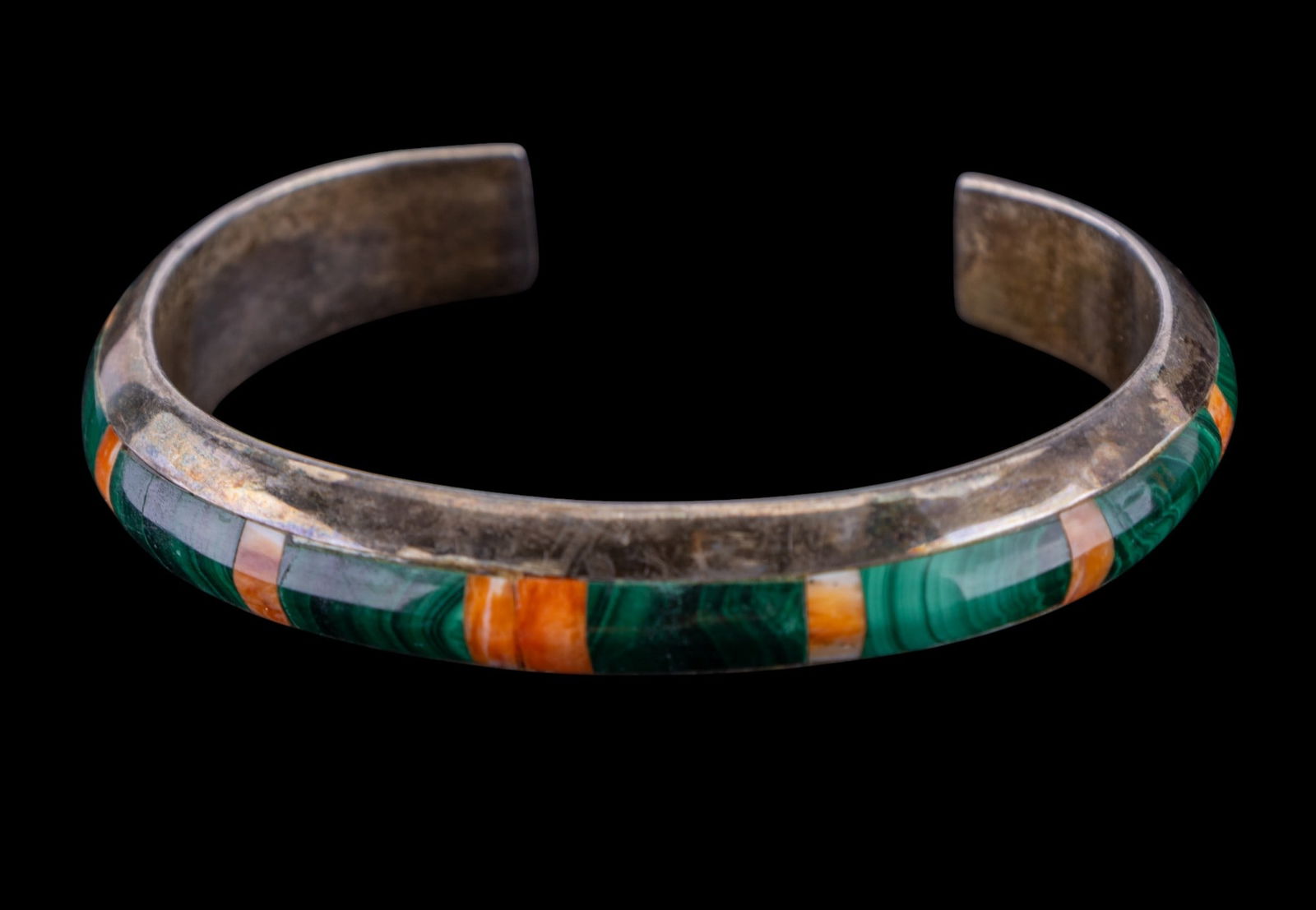 Charles Platero Jr Native American 925 Bracelet: Native American sterling silver cuff bracelet with malachite and coral inlay signed by artist Charles Platero Jr.