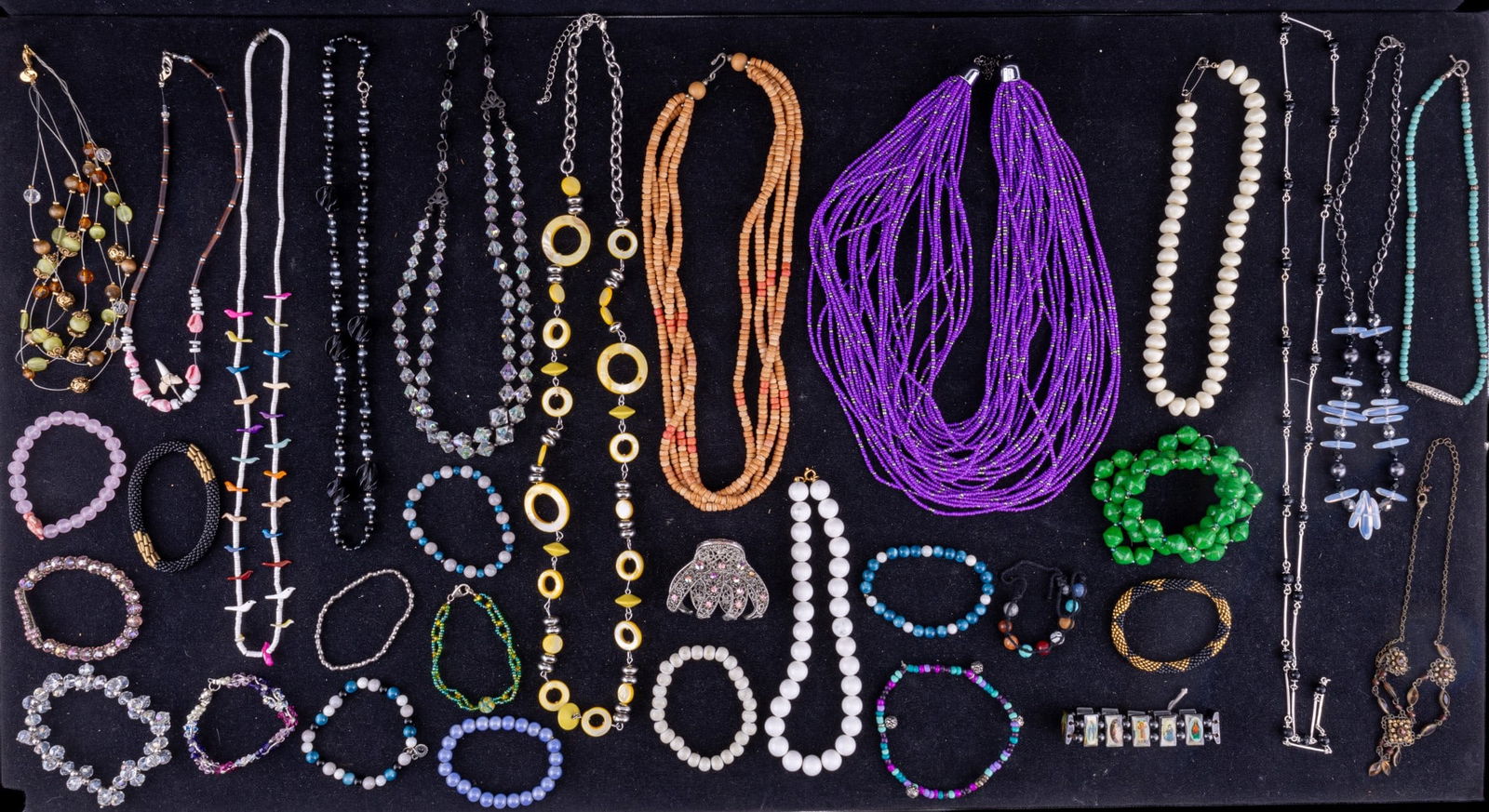 Lia Sophia Jewelry w/ Natural Stones: A collection of Lia Sophia jewelry featuring natural stones, beaded, rhinestone Lia Sophia + more showcasing a variety of colors, designs, and styles.