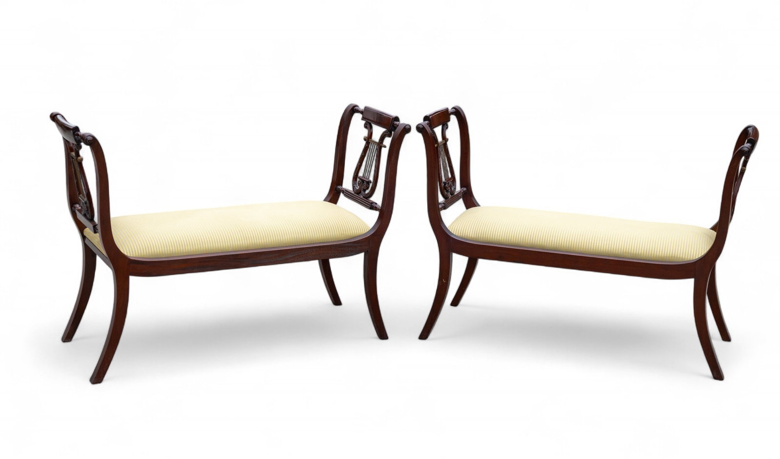 Pair of Duncan Phyfe Window Benches: Fine pair of Duncan-Phyfe window benches with finely carved lyre splats with brass accents. Items measure approx. 33.5" high x 49" wide x 17.5" deep each.