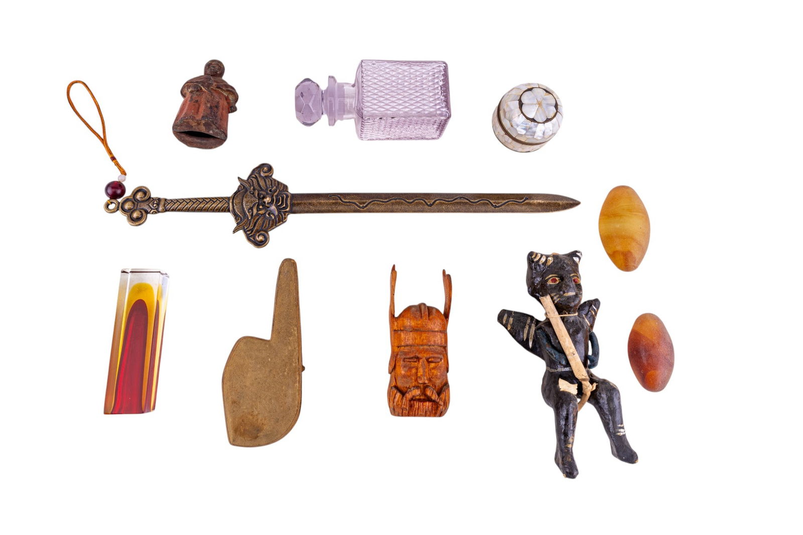 Ceremonial Dagger, MOP Box, Mammy, Meerschaum: A ceremonial bronze dagger likely of Asian origin measuring approx. 19" long, an early "Mammy" figurine made from painted metal measuring approx. 4" high (back of head missing), an early MOP trinket b