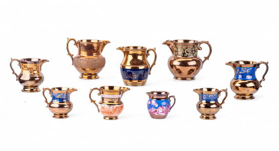 Vintage Lusterware Pitchers (9): An assortment of 9 vintage porcelain lusterware pitchers, heights range between 3.5" H to 6" H.