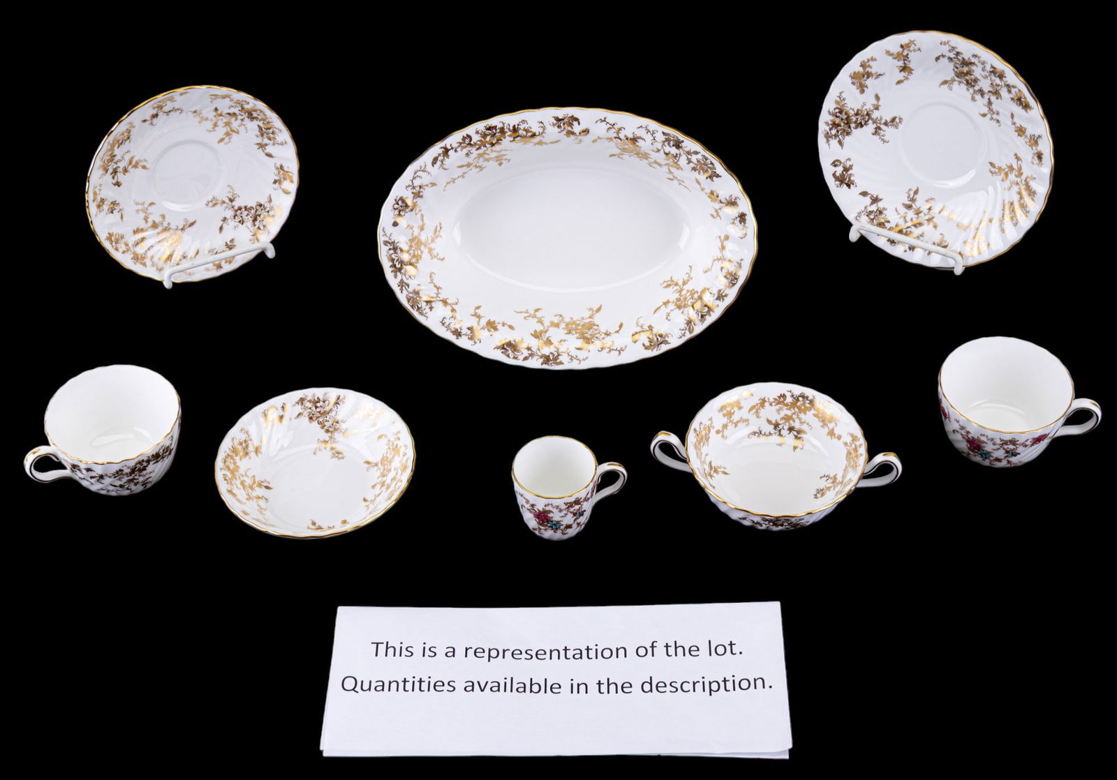 Minton Ancestral Bone China Set: Large Minton china set in the Ancestral pattern featuring 39 cream soup bowls, 32 soup bowl saucers, 15 fruit bowls, 25 gold Ancestral teacups, 32 gold Ancestral tea cup saucers, 6 colorful Ancestral