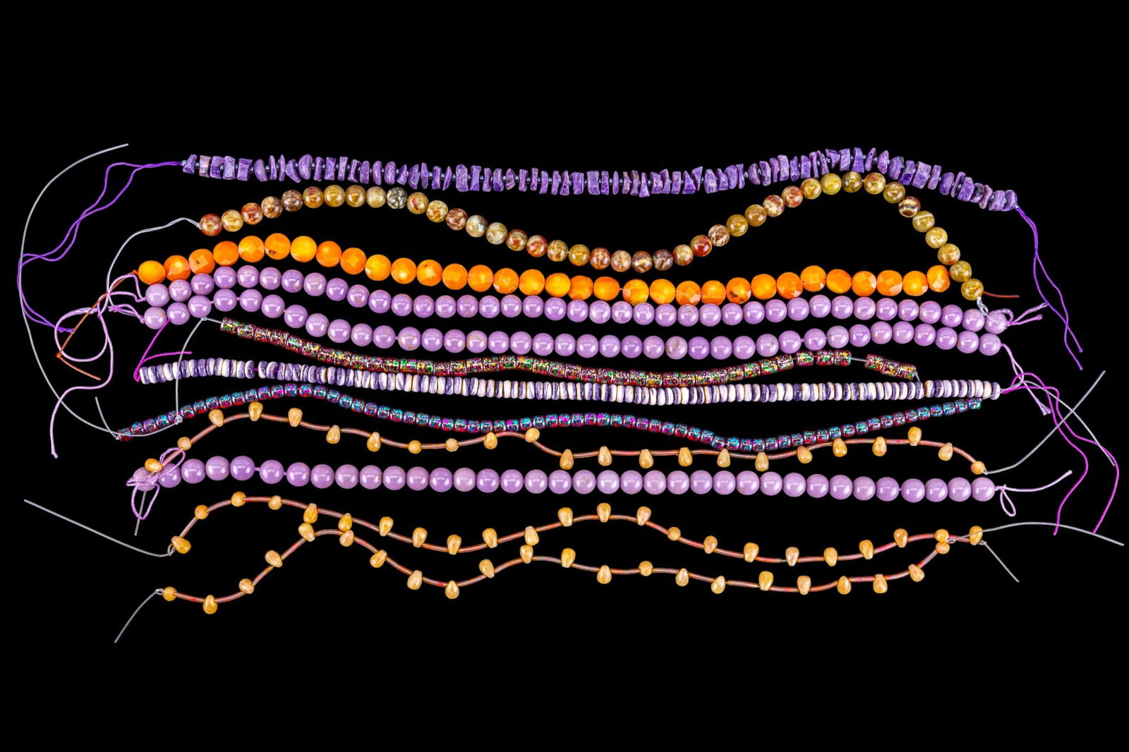 Vintage Semi-Precious Stone Strands: Vintage semi-precious strands including amethyst, agate, shell, carnival glass, and other various strands.