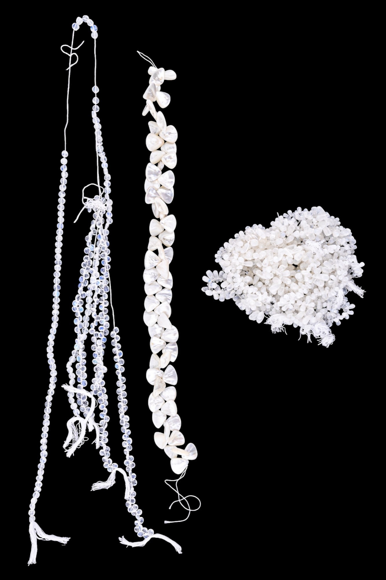 Vintage Quartz Strands: Large collection of white quartz and mother of pearl shells.