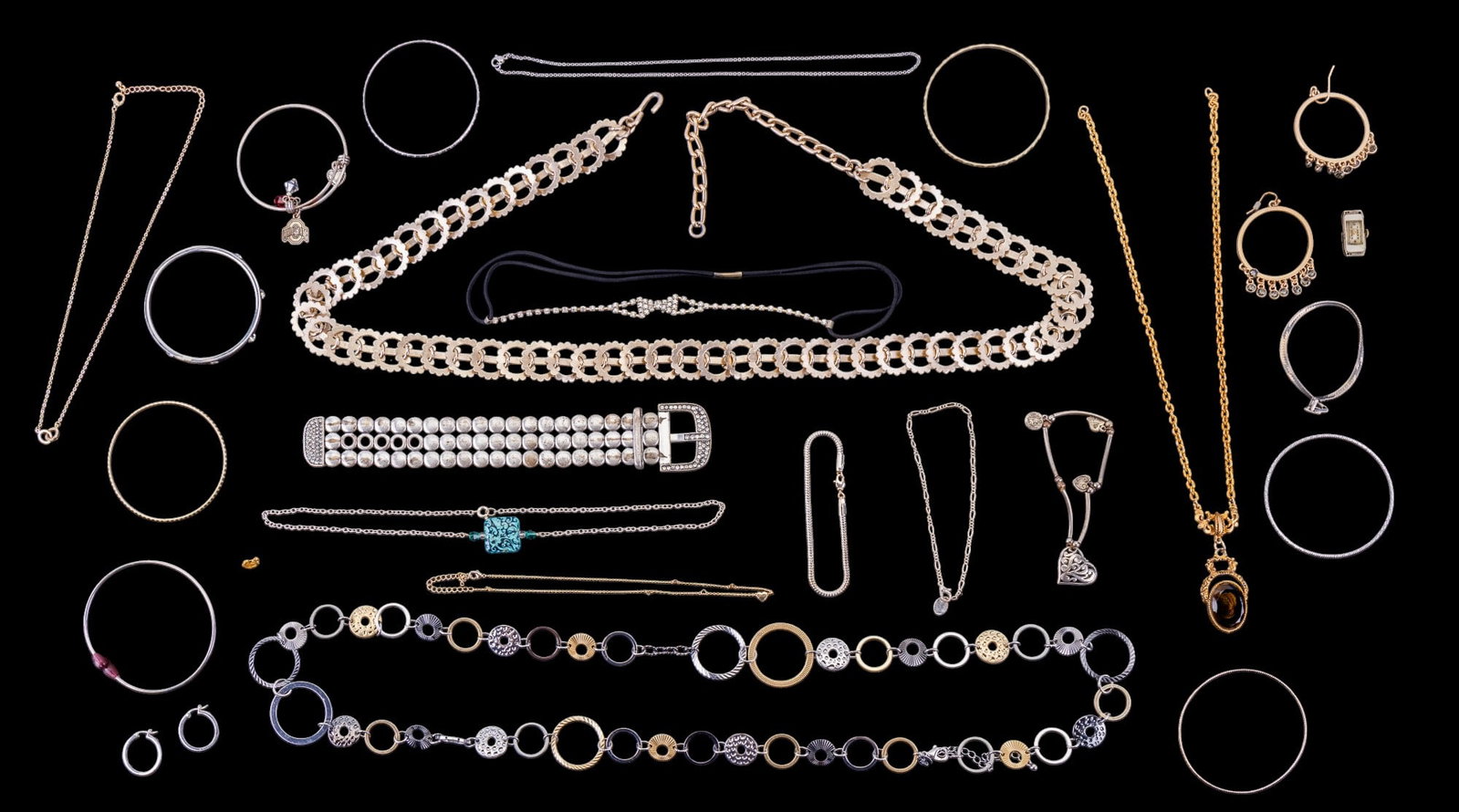 Rhinestone, Taramanda + More Jewelry: Jewelry assortment including a Pandora style bracelet marked Taramanda, a Claire's bracelet, rhinestone accents pieces and a Burob watch face, an art glass cameo style pendant on gold tone chain, deco