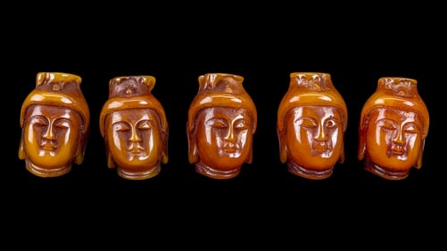 Carved Guan Yin Amber Beads