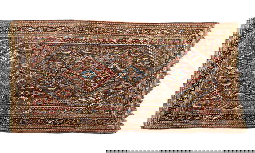 Antique Persian Rug (KAI#14): Antique hand woven Persian rug with blue and red floral geometric motif, note fringe loss and moth damage 4'1" x 7'8"