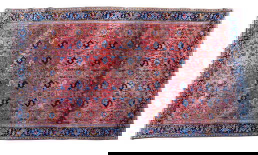Antique Persian Rug: An antique Persian rug measuring approx. 140" x 87" with floral / geometric design on red background with blues, greens, pinks, and reds.