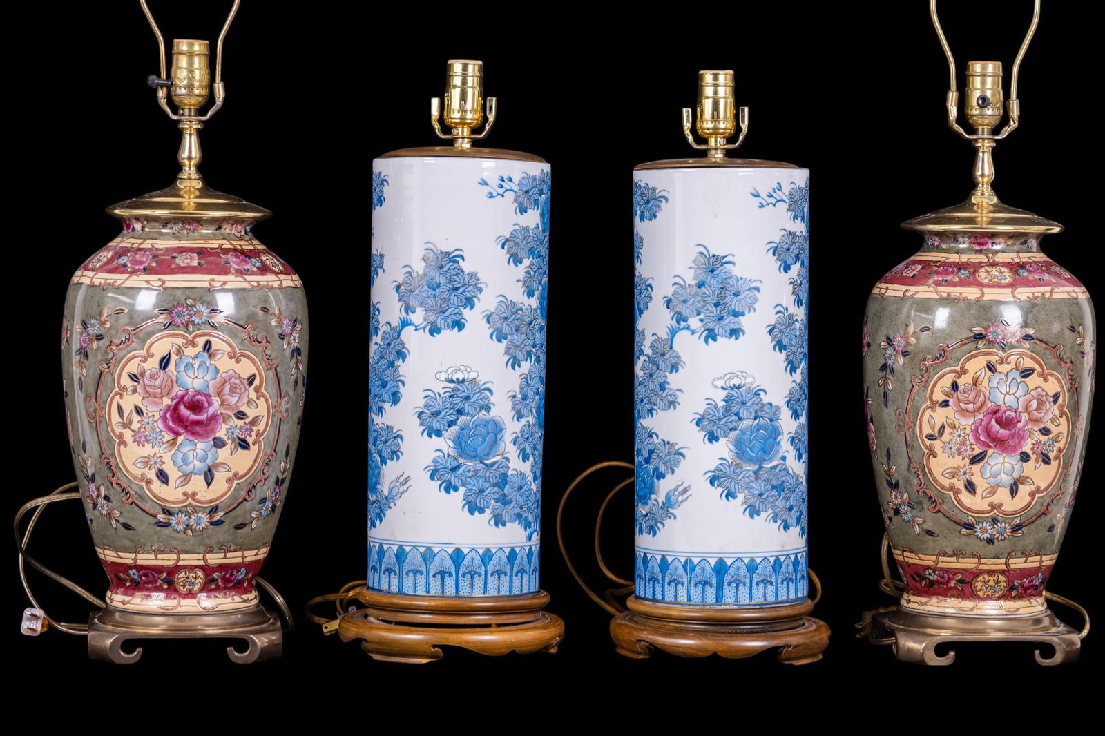 Asian Influence Porcelain Lamps (2 Pairs): Two pairs of painted Asian decorated lamps, likely vase conversions. First pair is a white base and blue painted cylindrical lamp pair measuring approx. 21.5" high x 6.5" diameter with no harps, secon