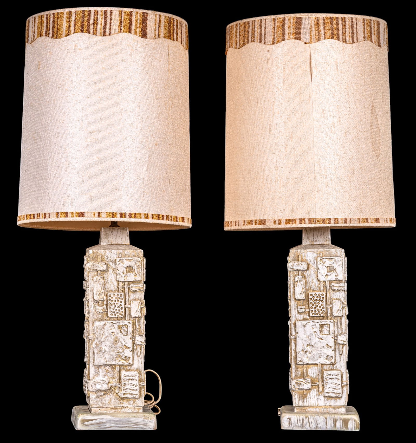 Mid Century Brutalist C.N. Burman Lamps (2): A pair of plaster composite mid century Brutalist C.N. Burman table lamps, on a wooden square base, untested, includes cylindrical fabric shades, note some discoloration spots, measures approx. 7" W x