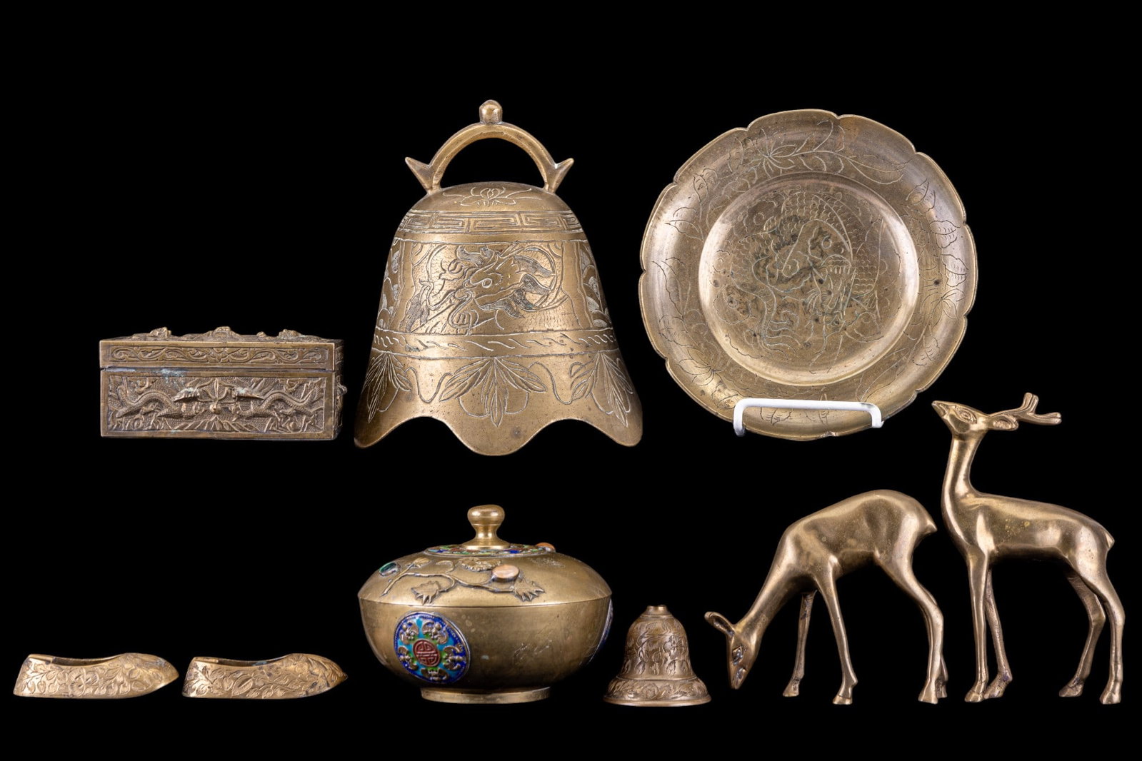 Etched Brass, Enameled Brass, and Figurines: High relief, wood lined keepsake box depicting dragons on all sides, marked 'CHINA', note broken hinges, hollow brass buck and doe figurines, marked 'INDIA', two etched brass bells, one 4" H is marked