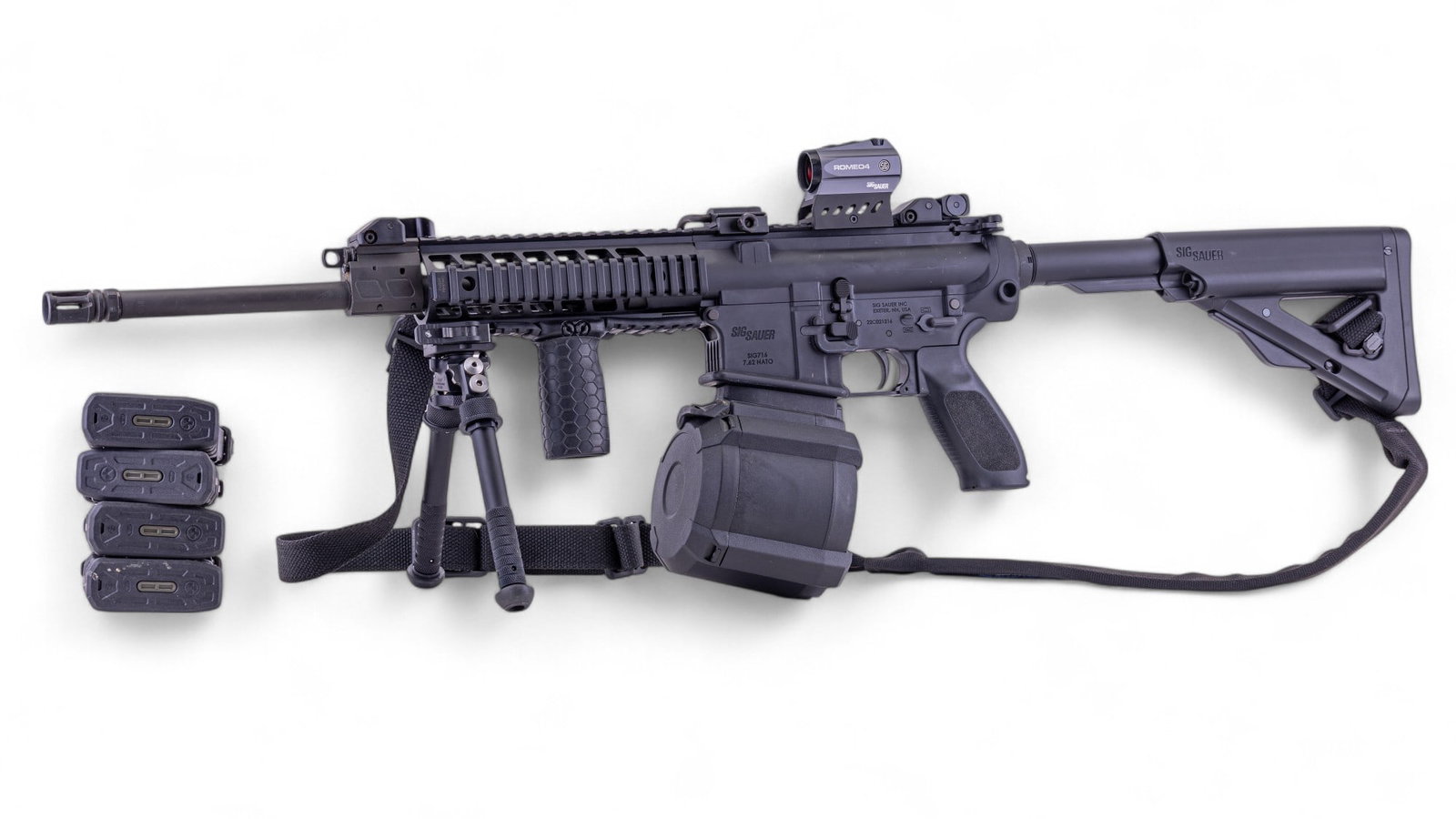 Sig Sauer SIG716 7.62 NATO Rifle w/ ROMEO4, Bipod: A Sig Sauer SIG716 7.62 NATO rifle with multiple attachments, a 50 round drum magazine, and six PMAG 25 LR/SR Gen M3 Window 25 round magazines. Attachments include a Sig Sauer ROMEO4 compact red dot s